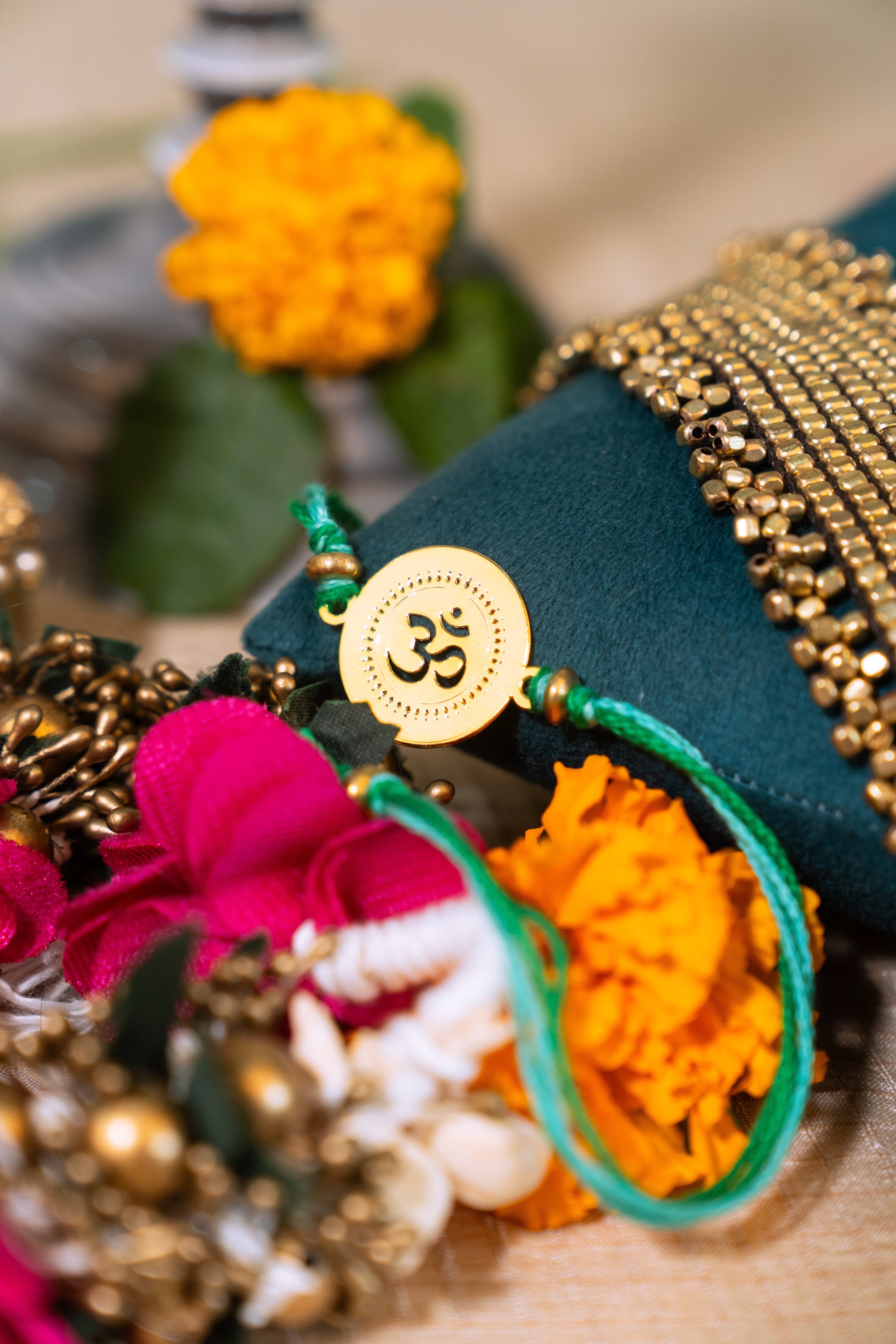 Om Rakhi Round | Gold Finish Rakhi