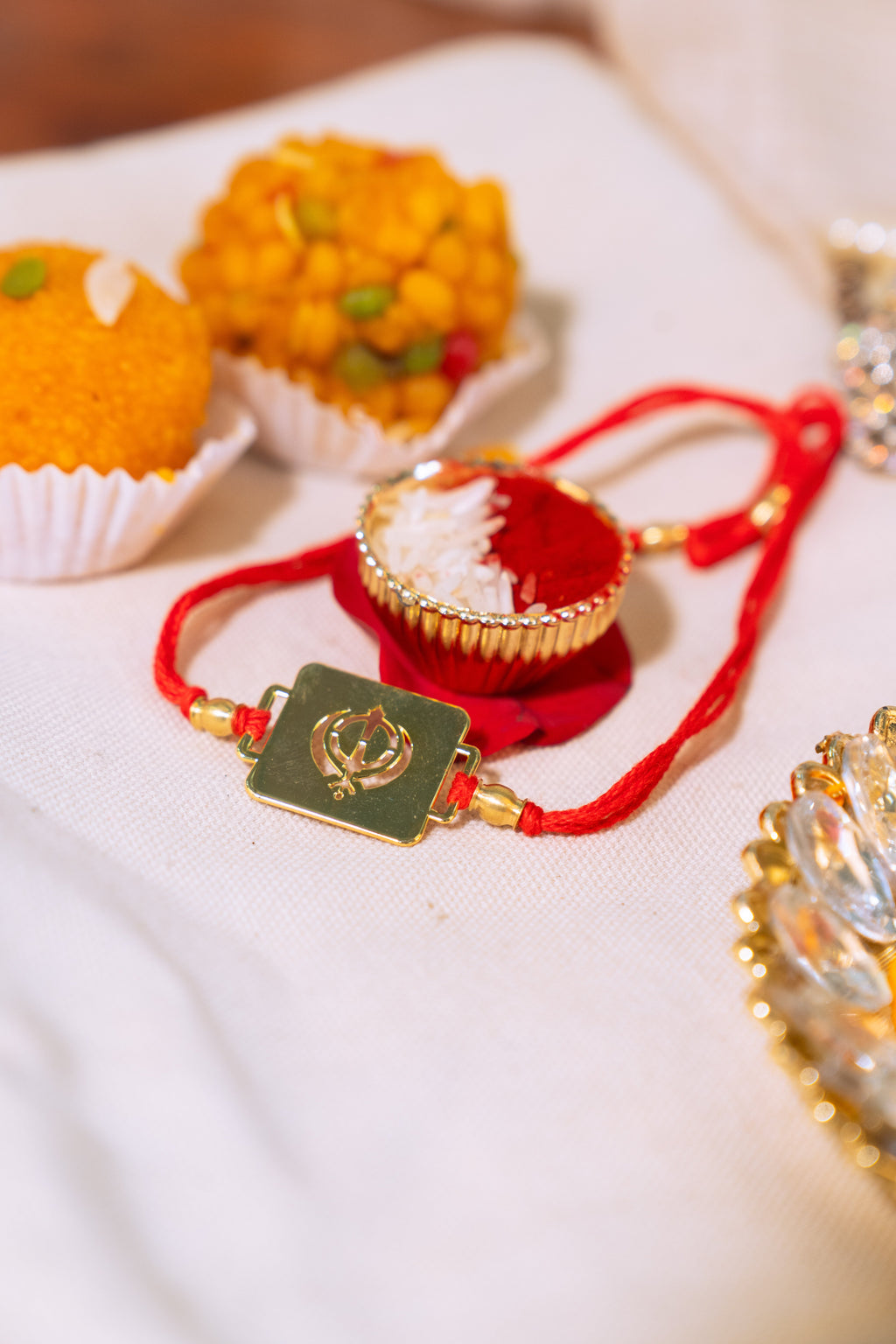 Khanda Square Rakhi | Gold Finish Rakhi