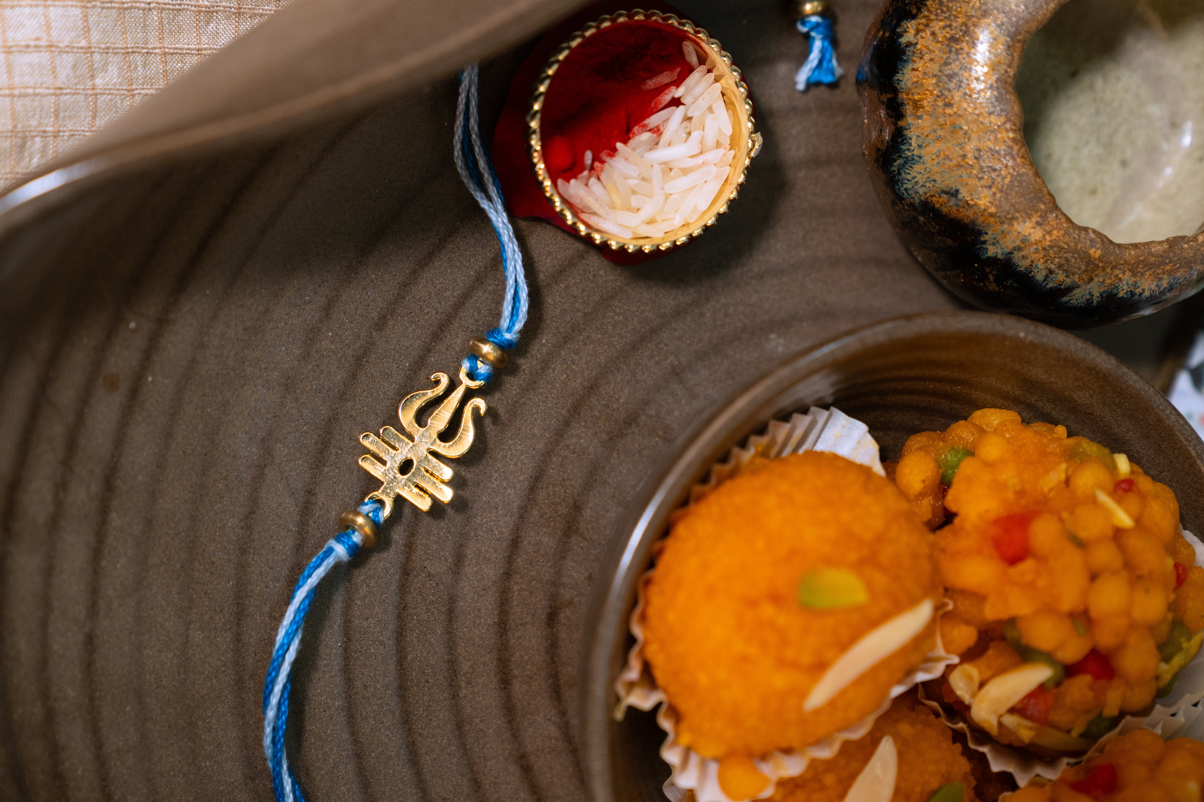 Trishul Rakhi | Gold Finish Rakhi